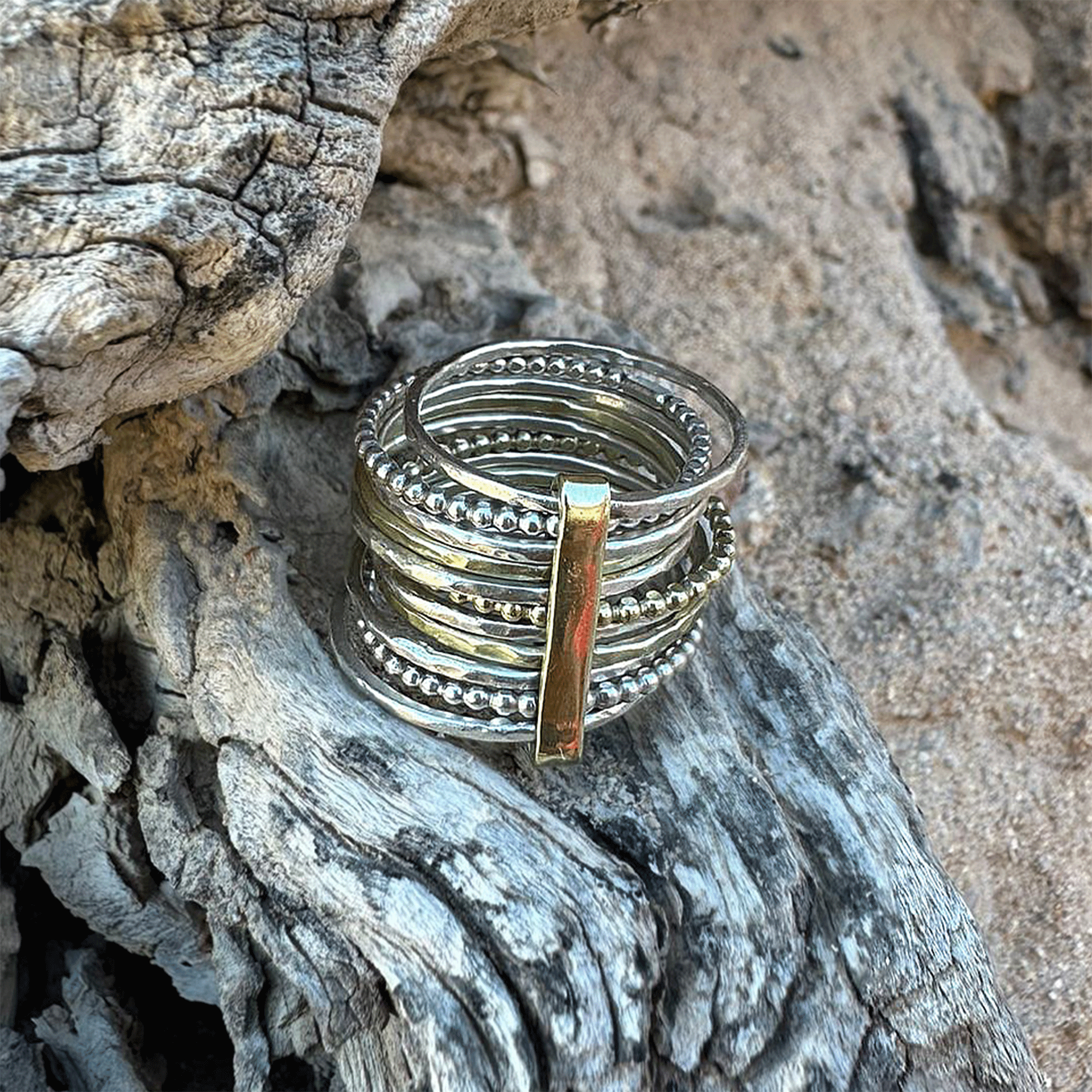 11 STAPELRINGETJES 14 K GOUD EN STERLING ZILVER