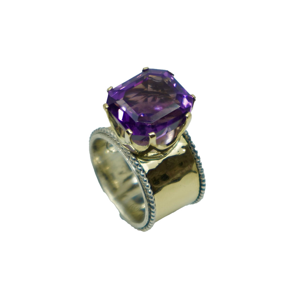 14K GOUDEN RING MET ZILVERDRAAD EN PAARSE STEEN