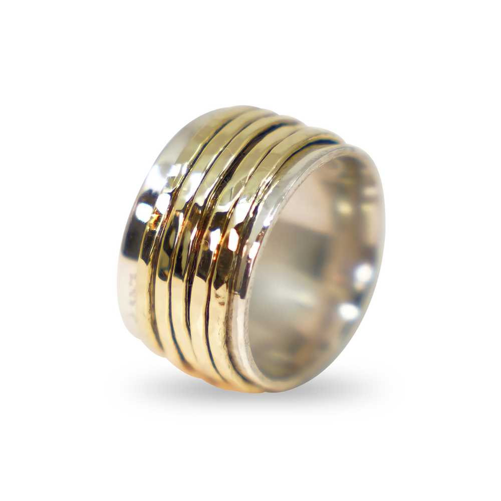 ZILVEREN RING MET LOSSE GOUDEN. RINGETJES